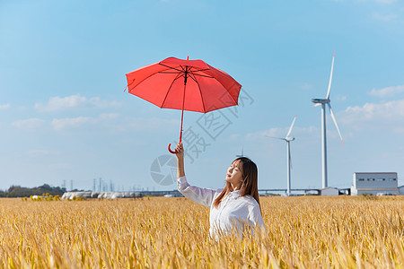 文艺美女手撑红色雨伞高清图片