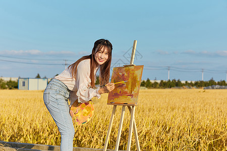 文艺清新美女户外油画写生图片