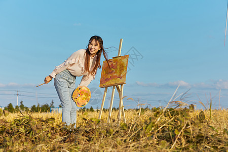 文艺清新美女户外油画写生图片