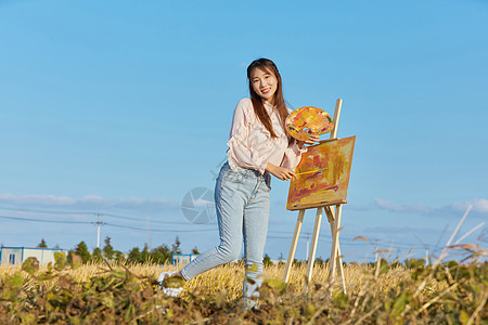 文艺清新美女户外油画写生图片