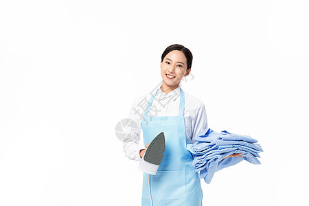 家政服务女性熨烫衣服图片