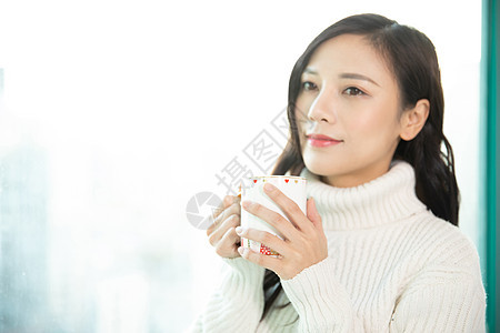 冬季居家女性保暖喝咖啡图片