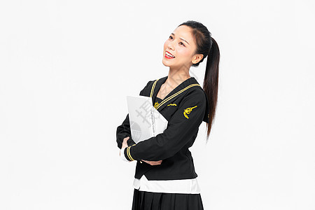 学院风大学生JK服美女抱书本图片