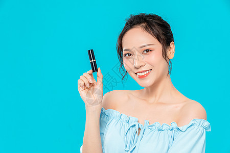 美女拿口红展示图片