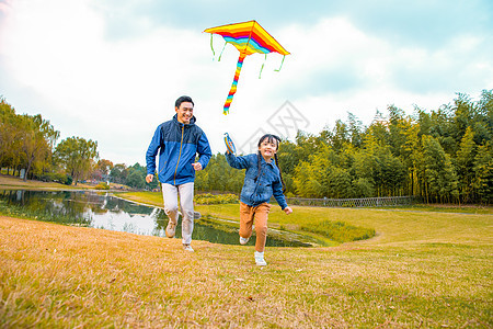 爸爸和女儿放风筝背景图片