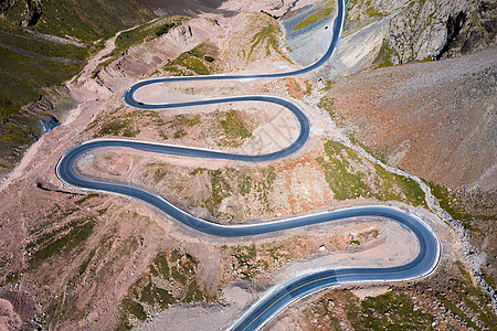 山路十八弯航拍新疆山野盘山公路背景