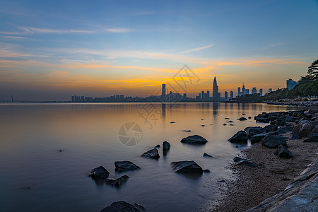 城市云夕阳云下深圳湾公园背景