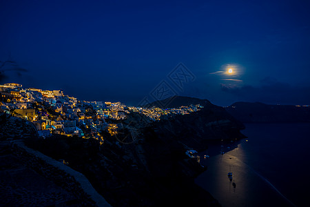 风车夜景圣托里尼半岛与月同明背景