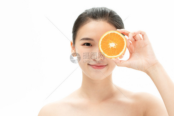 美妆少女与橙子图片