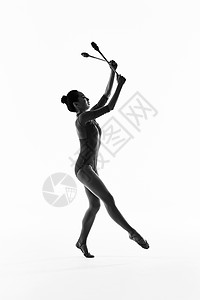 女性剪影年轻女性艺术体操棒操动作展示背景