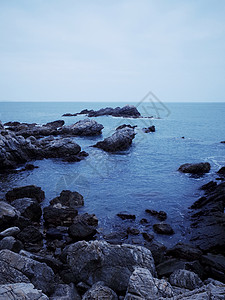 深圳东西涌傍晚海边沙滩夜景高清图片