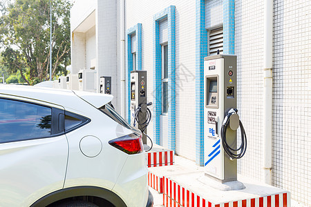 新能源汽车充电桩场景背景图片