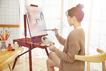 艺术人物文艺美女在家画油画背景