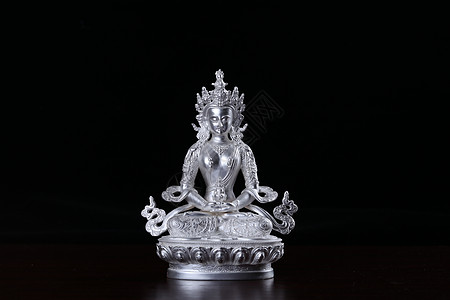 藏传佛像尼泊尔藏传佛教纯银佛像背景