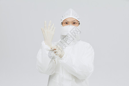 穿防护服戴手套的医护人员高清图片