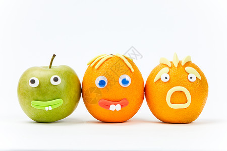 橙子创意愚人节创意水果组合背景