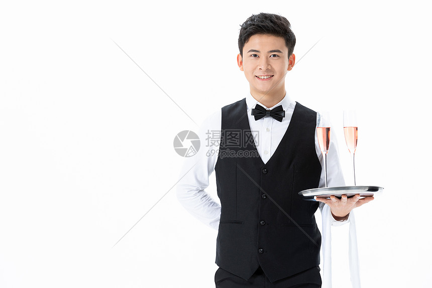手捧香槟杯服务的男性服务员图片