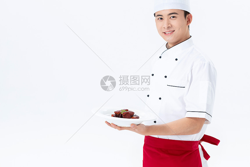 厨师手捧红烧肉菜品图片