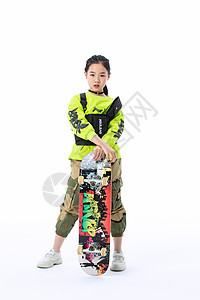 时尚嘻哈潮流儿童拿着滑板背景图片