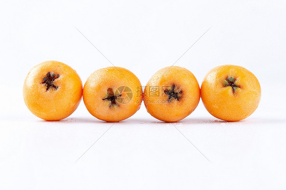 新鲜枇杷水果背景图图片