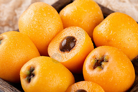 沙糖橘枇杷水果背景图背景