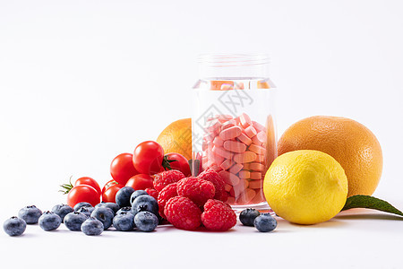 钙片和水果背景图片