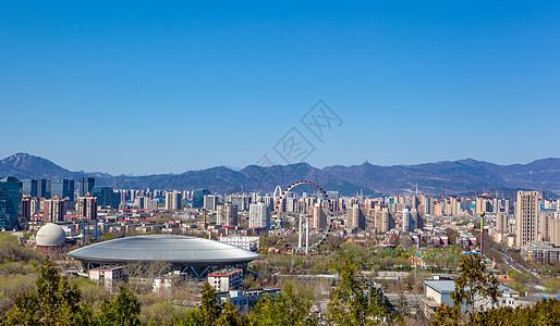 俯视北京老山自行车场馆与石景山游乐园背景图片