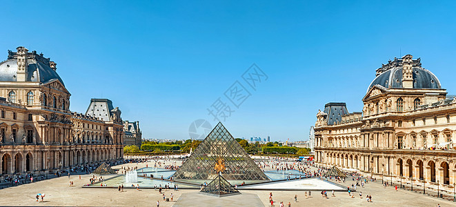 展会入口法国巴黎卢浮宫全景金字塔入口背景
