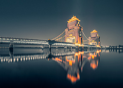 现代建筑特写扬州万福大桥灯光夜景背景