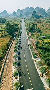 航拍风光公路美丽风景笔直蜿蜒的山景公路图片