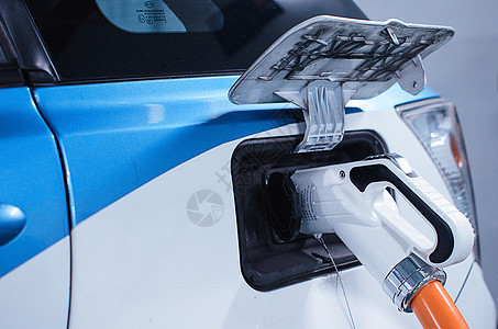 车加油电动汽车的充电插口背景