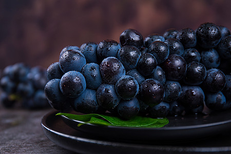 葡萄采摘特写拍摄黑提水果背景