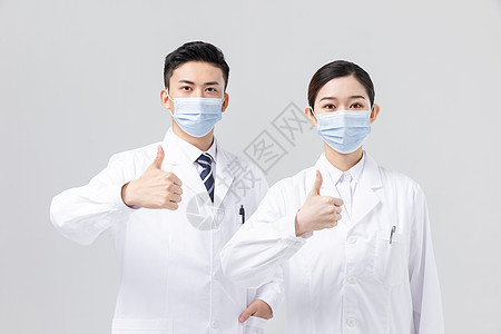 戴口罩的护士戴口罩戴点赞医生团队形象背景