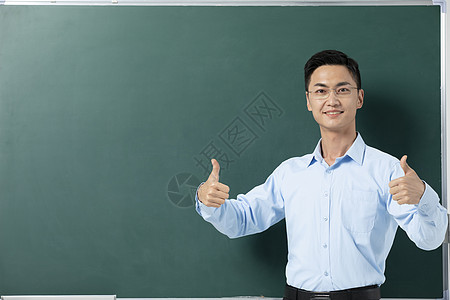 黑板前的男性教师讲课奋斗高清图片素材