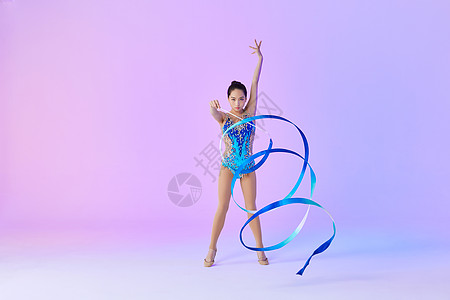 紫色彩带艺术体操带操动作展示背景