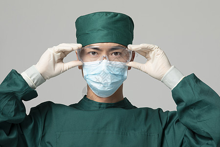 男性医生防疫戴口罩护目镜背景图片