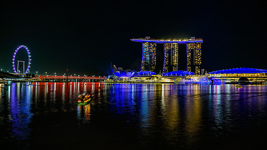 新加坡金沙酒店的夜景背景图片