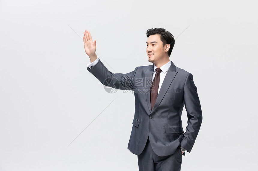 西装商务男性招手