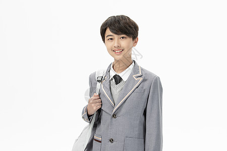 背着书包的阳光男孩形象图片素材