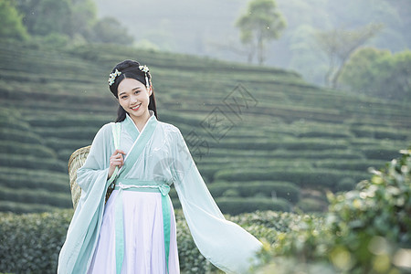 古风美女汉服古装美女背茶篓采茶背景