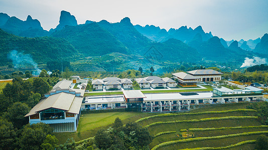 航拍山顶的酒店民宿旅游业桂林旅游航拍背景图片
