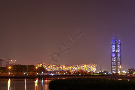 北京国家体育场鸟巢夜景灯光背景图片