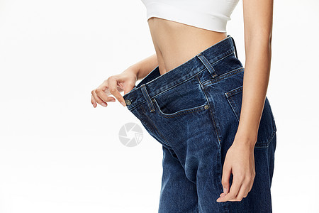 年轻女性减肥瘦身成功背景图片