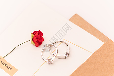 七夕情人节标签信件与戒指背景