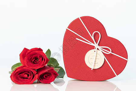 玫瑰花与礼物盒静物背景图片