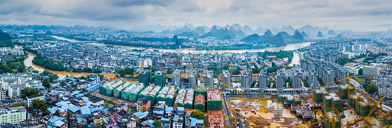 全景航拍夏季暴雨洪水围城内涝建筑群图片