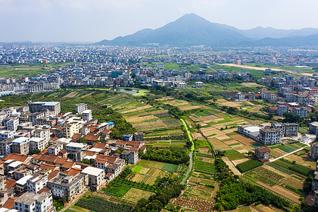 房屋土地航拍新农村与农田背景