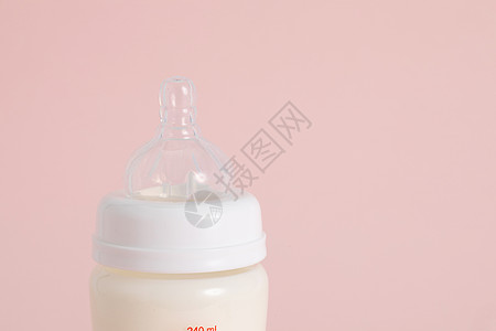 新生儿奶瓶背景图片