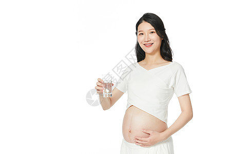 孕妇手拿水杯图片