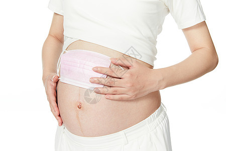 孕妇将口罩放在肚子上面图片